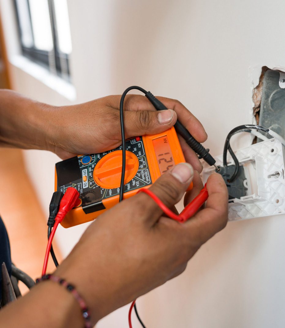 Electrician-fixing-outlet-to-prevent-electrocution