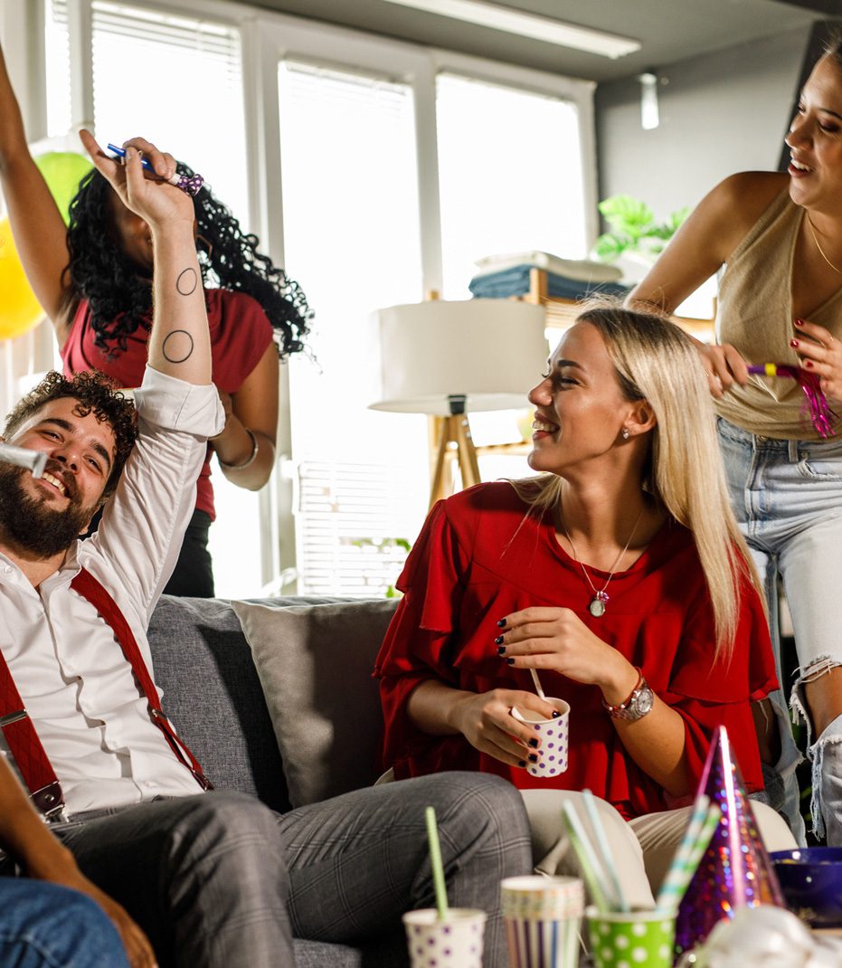 Group-of-friends-celebrating-birthday-at-Airbnb-rental