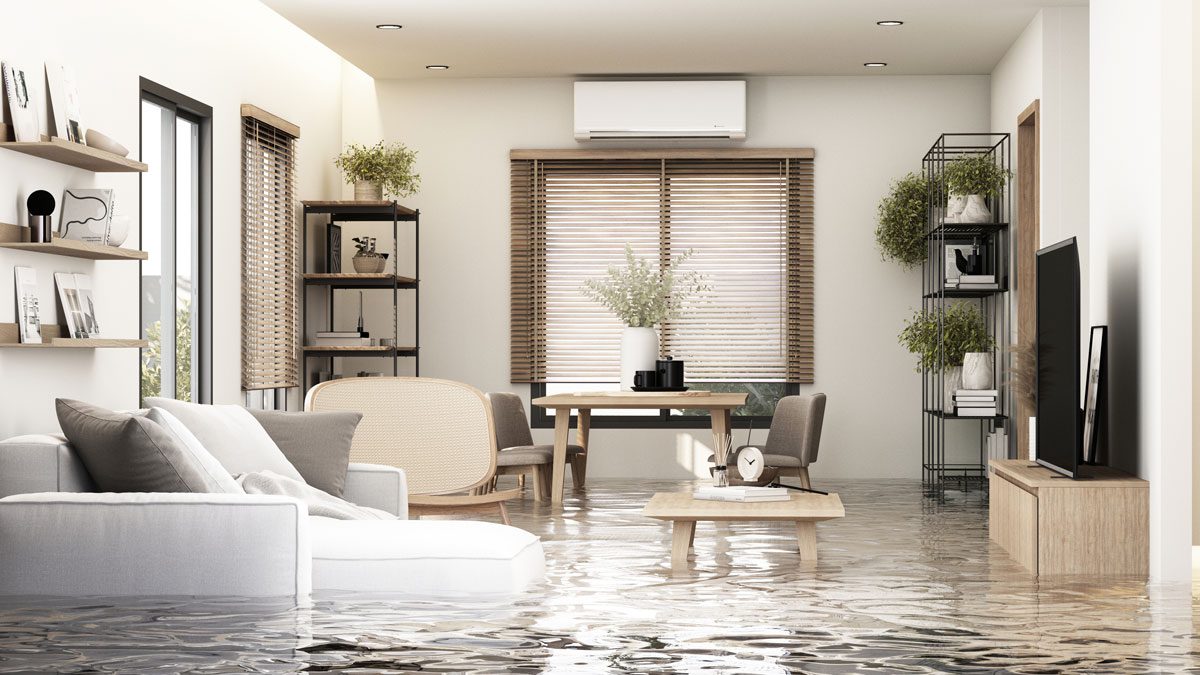 Flooded living room with water covering furniture